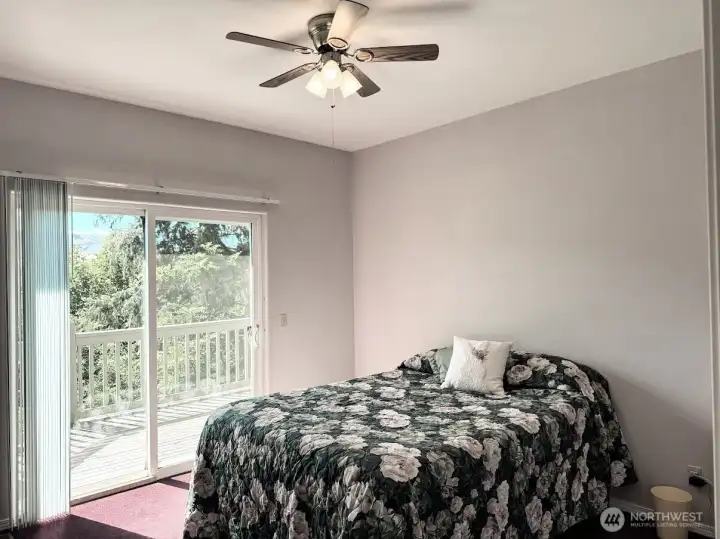 primary bed with private slider to deck & views!