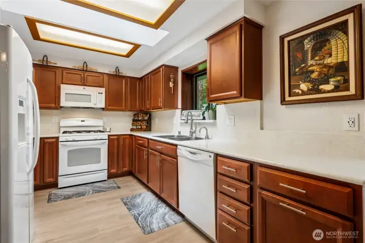 Updated kitchen with modern finishes and functional workspace.