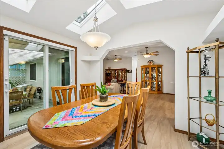 Sliding glass door opens directly to the covered patio, extending your living space outdoors.