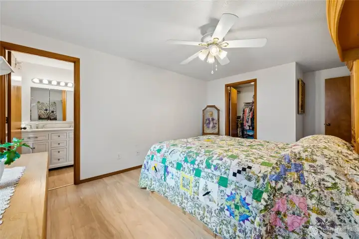 Spacious primary bedroom with a walk-in closet and private en-suite bath.