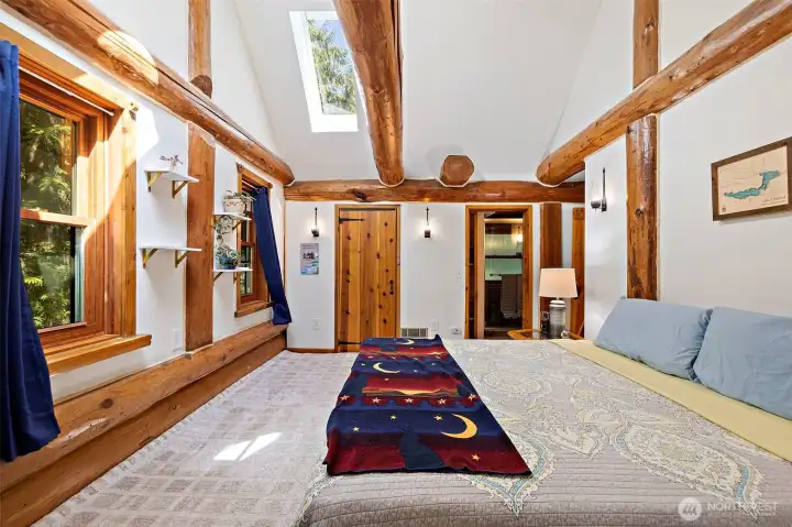 Upstairs bedroom with skylights