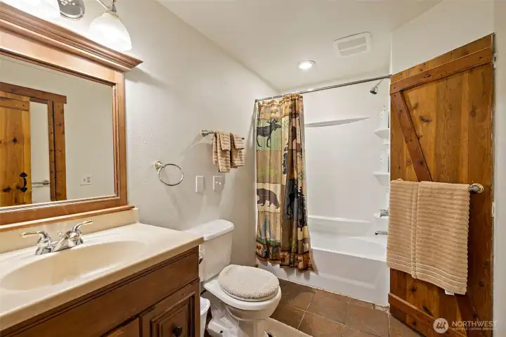 Basement bathroom with sauna (not pictured)