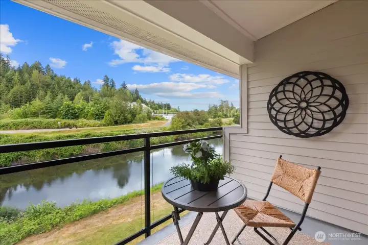 Sip on a beverage while taking in the gorgeous view of the river Sip on a beverage while taking in the gorgeous view of the river