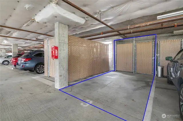 One of two secure covered parking spaces for this unit. Also ample guest parking. This parking space has a storage area in front of it.