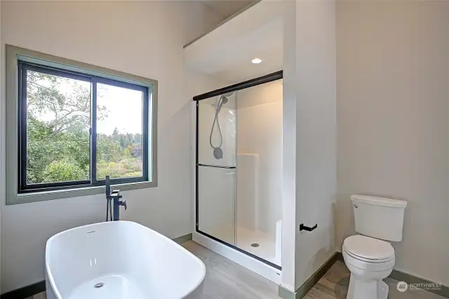 Relax in the large soaking tub while enjoying lake views.