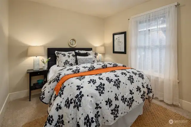 One of two bedrooms with a recently refreshed bathroom in between. No wasted space in this home.