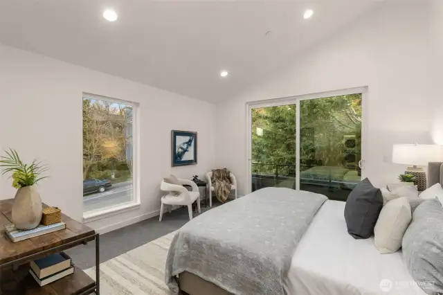 Primary Suite w/ Vaulted Ceilings.