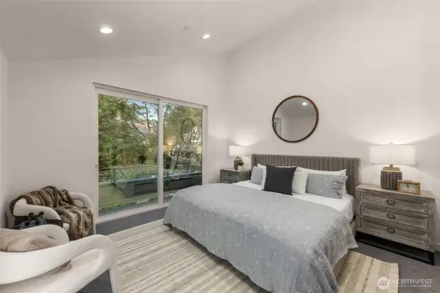Primary Suite w/ Vaulted Ceilings.