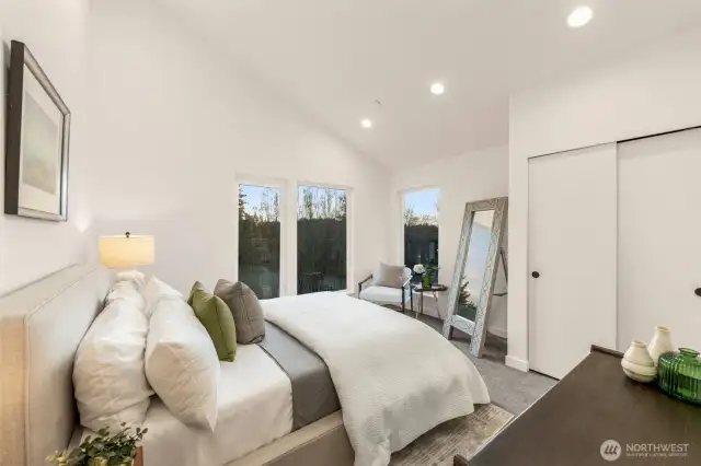Secondary En Suite Bedroom w/ Vaulted Ceilings.