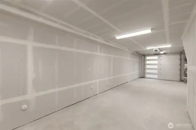 2 Car Tandem Garage w/ EV Outlet Standard.