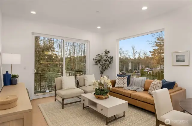 Open Concept Living Room with Expansive Windows.