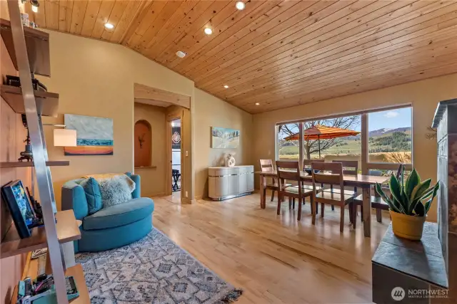 Dinner guests will want to linger with views like this. And the swivel stuffed chair tucking the corner is the ideal quiet spot to kick back and watch the world go by!