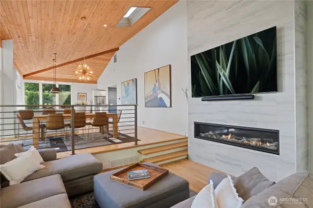 This view shows the beautiful gas fireplace and the amazing walls that are perfect for your art collection.