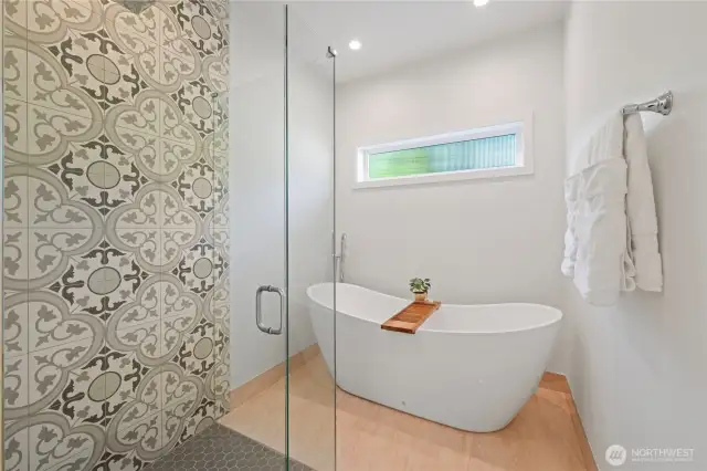 This is also the ensuite bath for the 2nd primary bedroom. The shower is a curbless entrance.