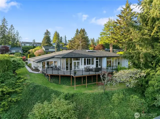 A view of the back of the house shows the size of the deck. New decking and railing!