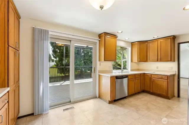 Kitchen eating are with slider leading out to the newer Trex deck!