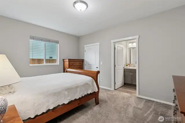 Primary bedroom with walk in closet