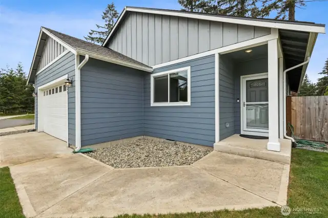Covered front porch with storm door