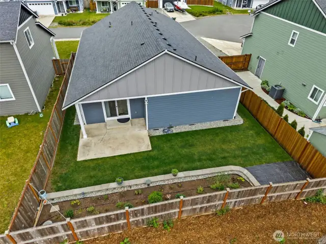 Large raised garden bed and fully fence backyard