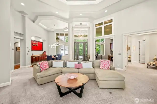 A truly custom design, this home continues the extra tall doors inside, soaring ceilings and transom windows!