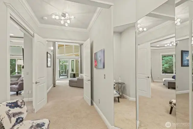Through tall french doors you enter into the luxurious primary retreat!