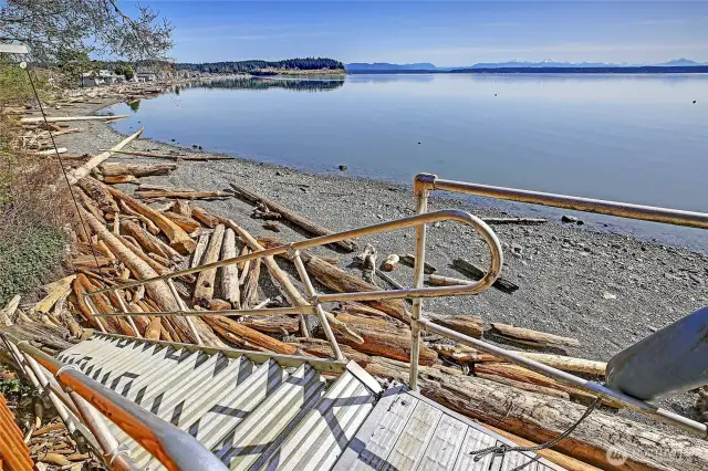 Many wonderful times and memories ahead on your own private beach! Note the retractable stairs at the bottom!
