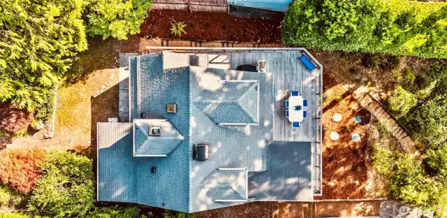 From overhead you can appreciate the thoughtful landscaping which includes fruit trees producing plenty of plums, apples and pears!