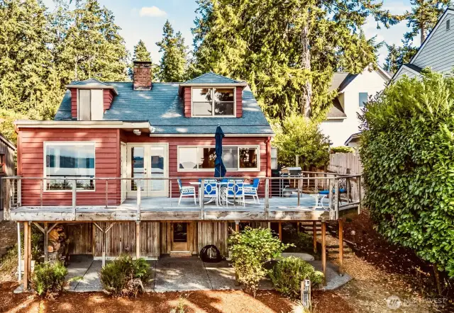 West facing, the back deck captures the sound and mountain views from most all rooms!
