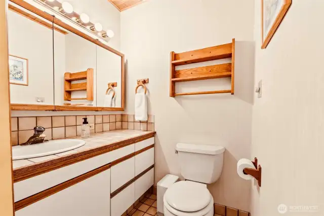 This powder bath is on the main level before teh primary bedroom.