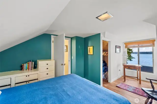 Cozy and with built in cabinets, this upper room has a walk in closet and striking views!
