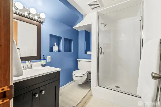 Yes! a 3/4 bath down, perfect for guests or multigenerational living!