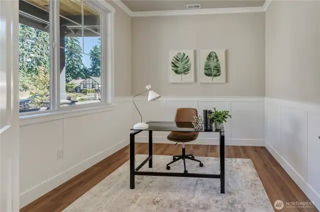 Our home office is well-appointed with energy-efficient and easy-to-clean vinyl clad windows. Let the light in!