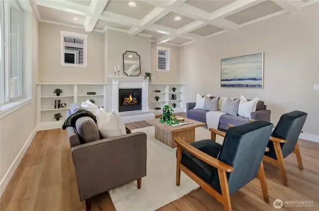 This great room includes durable and easy-to-clean extended hardwood flooring plus a hand-built box beam ceiling.