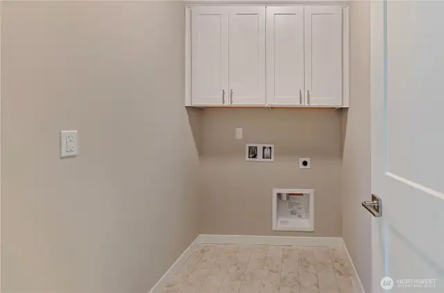 Our laundry areas provide ample space for your washer/dryer with easy hook-up and installed cabinetry above
