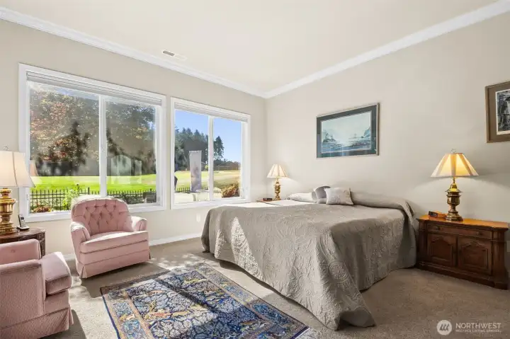 Expansive primary with views of golf course