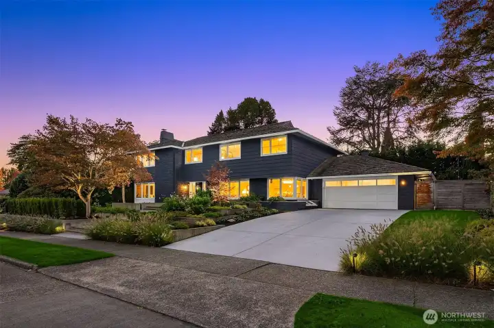 Large driveway and easy access to a 2 car garage with mud room/Laundry room as you enter.