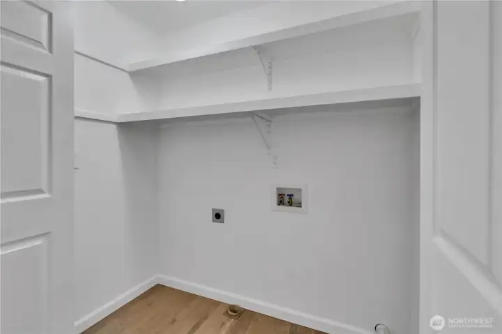 Laundry Closet located in hall