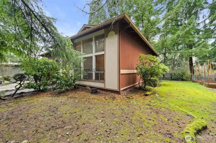 Side view of the home shows the expansiveness  of this property.