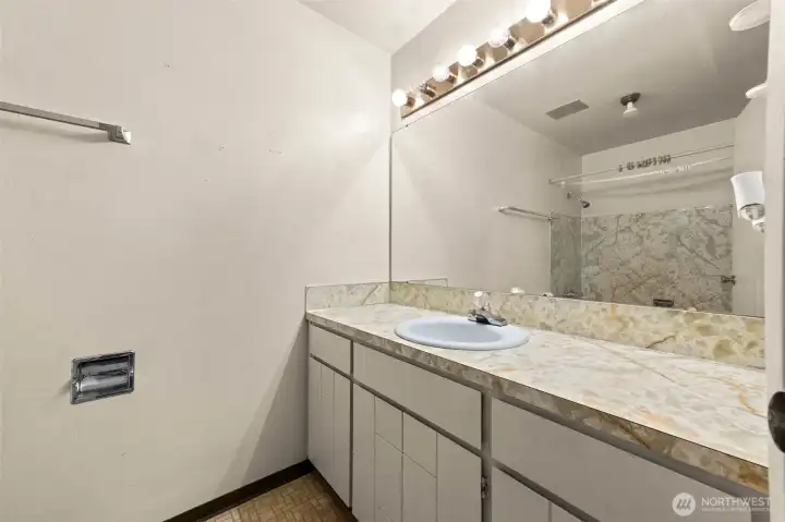 Full bath with the option to add a second sink to the counter there is so much space.