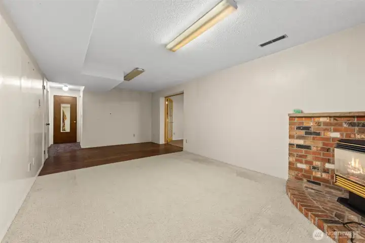 Additional view of downstairs living room.