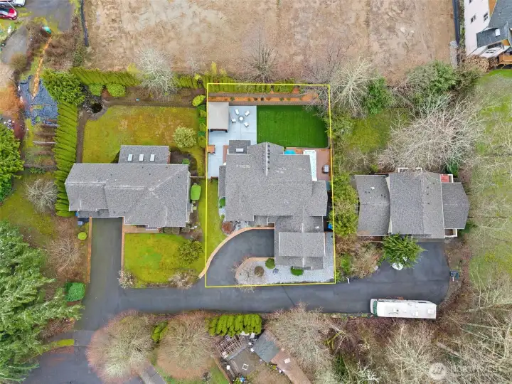 This aerial with approximate lot lines makes it easy to see exactly what you own, and it’s a great piece of property. Tucked at the end with just a few custom homes, this one sits in a sweet little pocket where things feel a bit more relaxed. Here’s the fun part, no HOA dues and no rulebook hovering over your shoulder, yet the surrounding neighborhood still offers parks and playground spaces that you can enjoy. It’s kind of the best of both worlds, structure where you want it, freedom where you don’t.