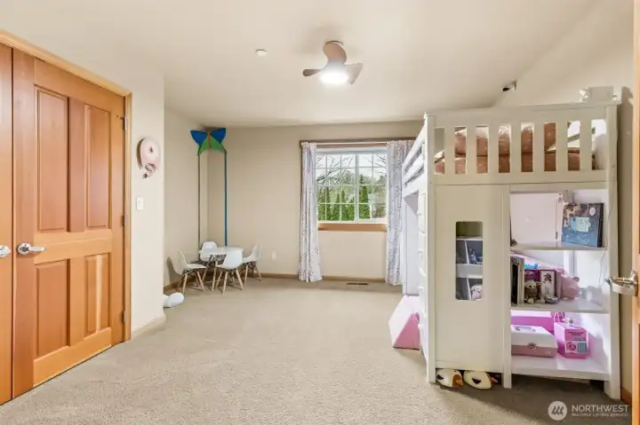 Not your average extra bedroom. This one comes in at a generous size and includes a French door closet with custom built-ins that feel more boutique than basic. There’s a sleek fan and light combo overhead.  Add a bunk bed, like this room has, and turn this into a ready-made guest or kid zone. Neutral tones keep things flexible, and the freshly cleaned carpet means it’s already feeling refreshed and ready for whatever you’ve got planned.