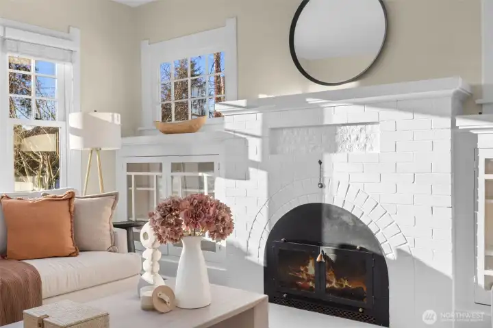 Wood-burning fireplace with insert.