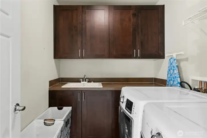 Convenient upper level laundry room.