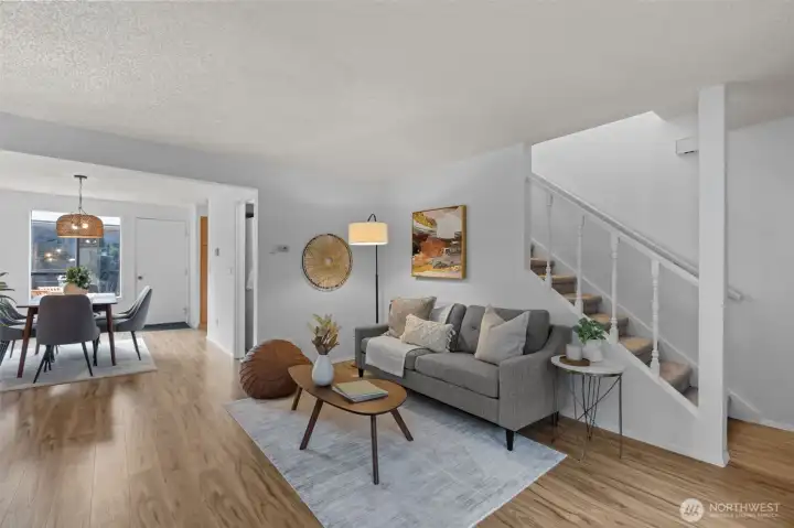 Enjoy abundant natural light, fresh neutral paint, and durable luxury flooring that flows seamlessly across the main living spaces.