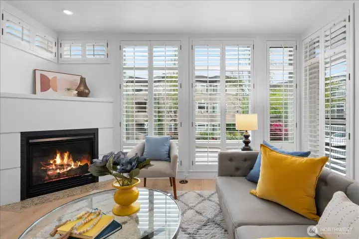 Light filled living room with gas fireplace