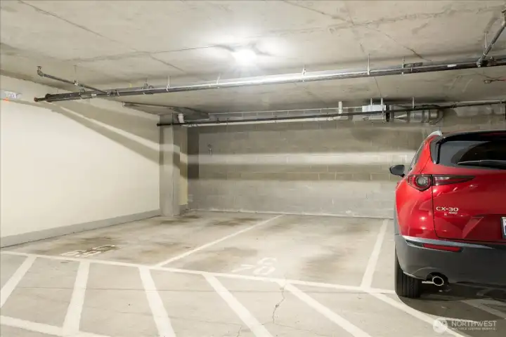 Secured parking space #70 close to elevator and storage unit