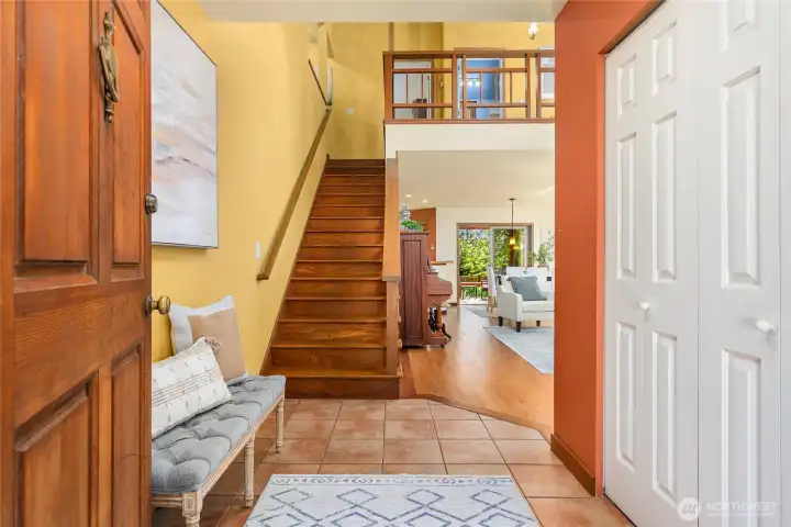 Entry way and hardwood staircase.