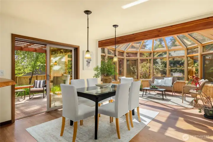 Dining area, solarium and doors to outside -flow naturally