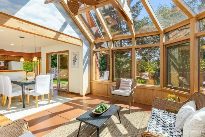 vaulted ceiling and a ceiling fan for comfortable living.